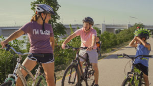 i'm back patient theresa biking with family