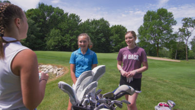 Lily Im Back playing golf with her friends