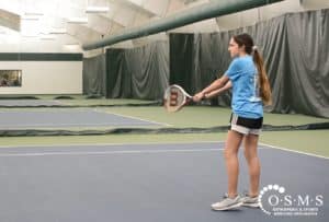 savanna playing tennis