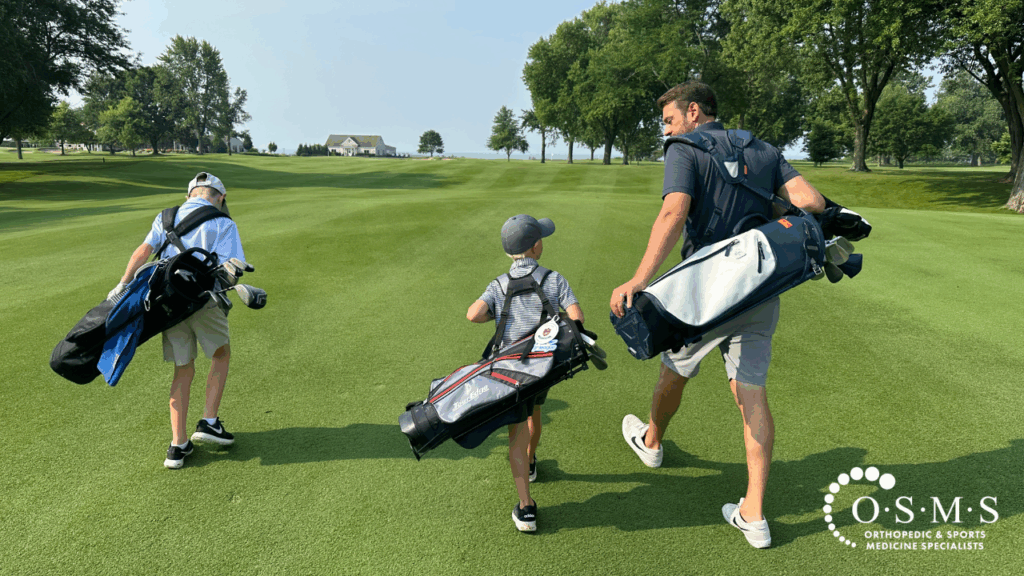 Ryan I'm Back - walking with his kids on the golf course