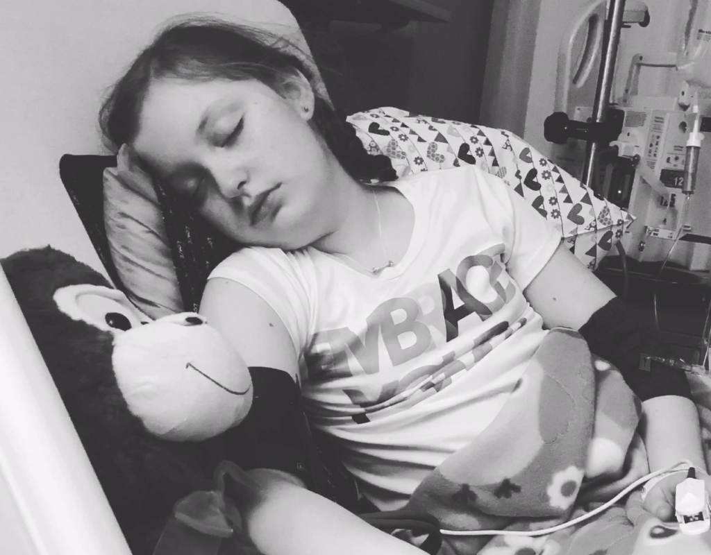 Lily when she was younger, getting an infusion